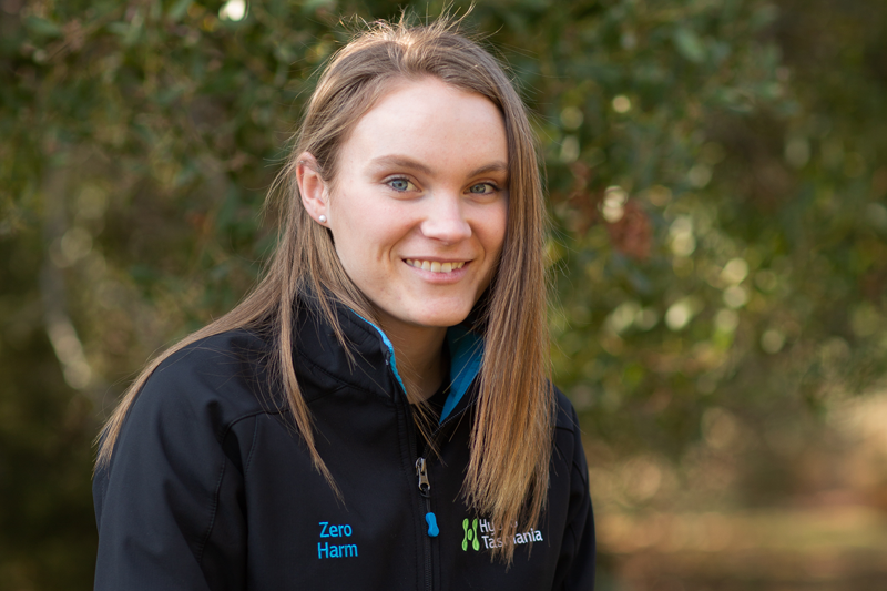 Hydro Tasmania employee sitting outside