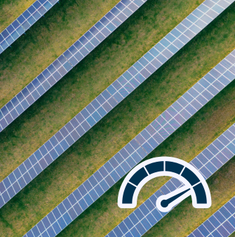 Rows of solar panels from above, with grass underneath